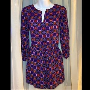 Romper with colorful vintage ornate floral pattern and cinched waist